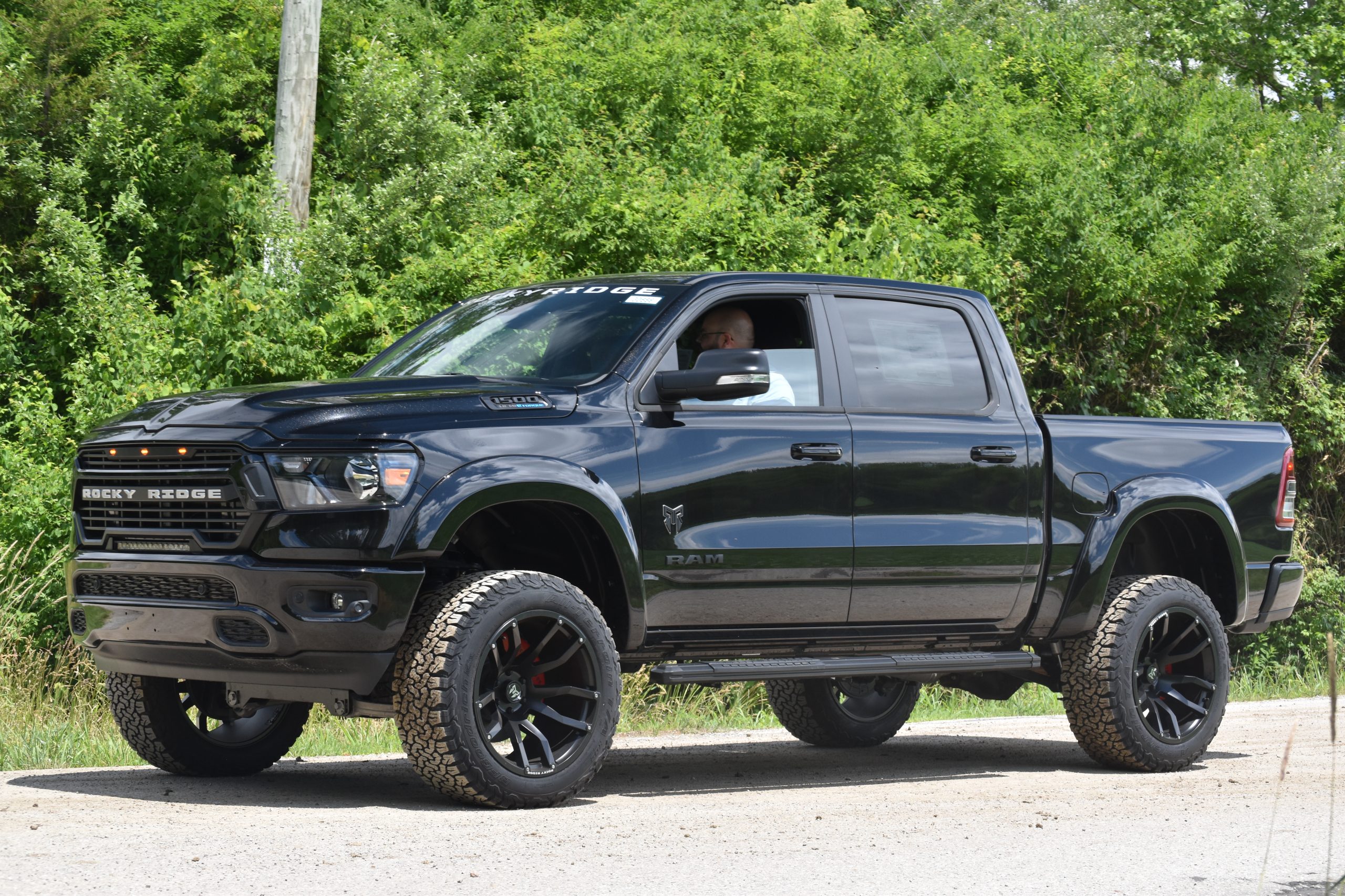 black lifted truck sherry chrysler vans